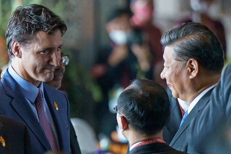 Canadian PM Justin Trudeau greets Chinese President Xi at the G20 meetings; c/o The Epoch Tiimes