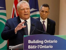 Ontario Premiere Doug Ford makes an announcement with Ottawa Mayor Mark Sutcliffe standing in the background;  c/o msn.com 