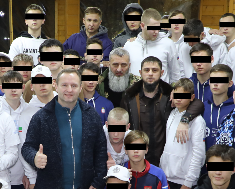 Ukrainian children pictured with their Russian abductors