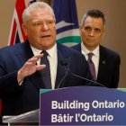 Ontario Premiere Doug Ford makes an announcement with Ottawa Mayor Mark Sutcliffe standing in the background;  c/o msn.com 