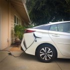 EV plugged into a home electrical outlet